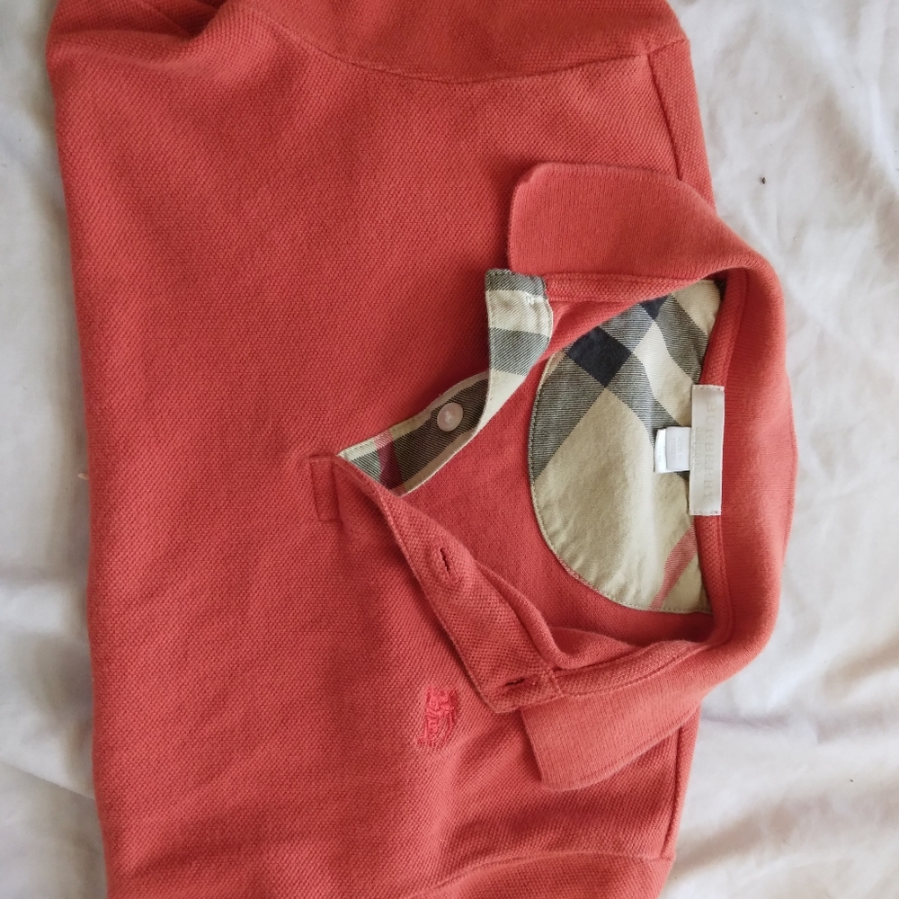 Orange burberry polo
